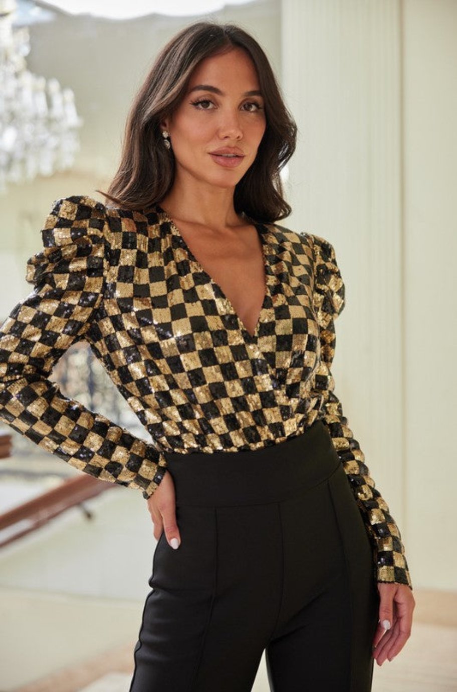 Gold and black checker sequin bodysuit with puff shoulders