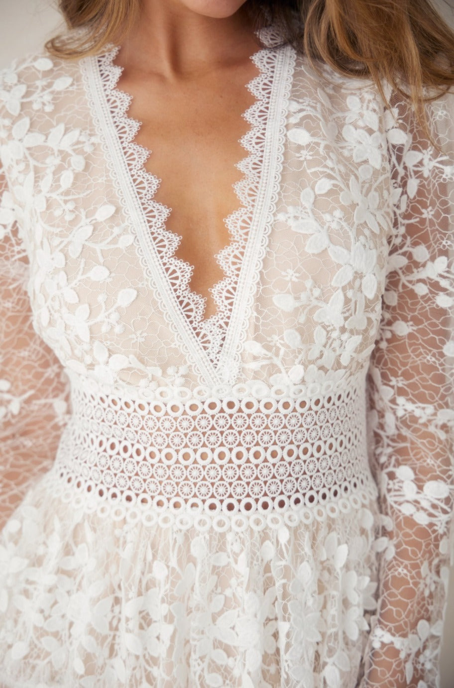 White lace mini dress, side view
