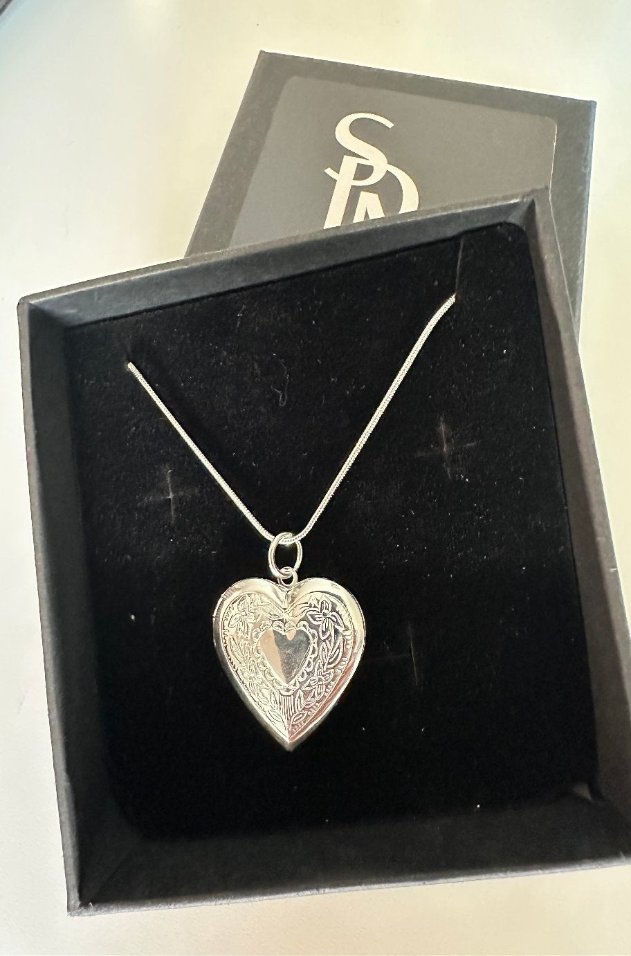 Silver heart locket necklace