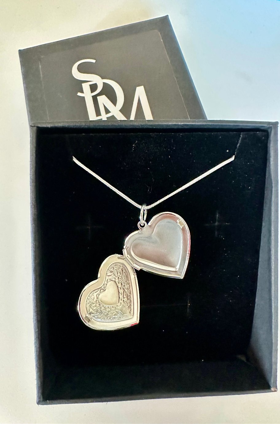 Silver heart locket, alternate view