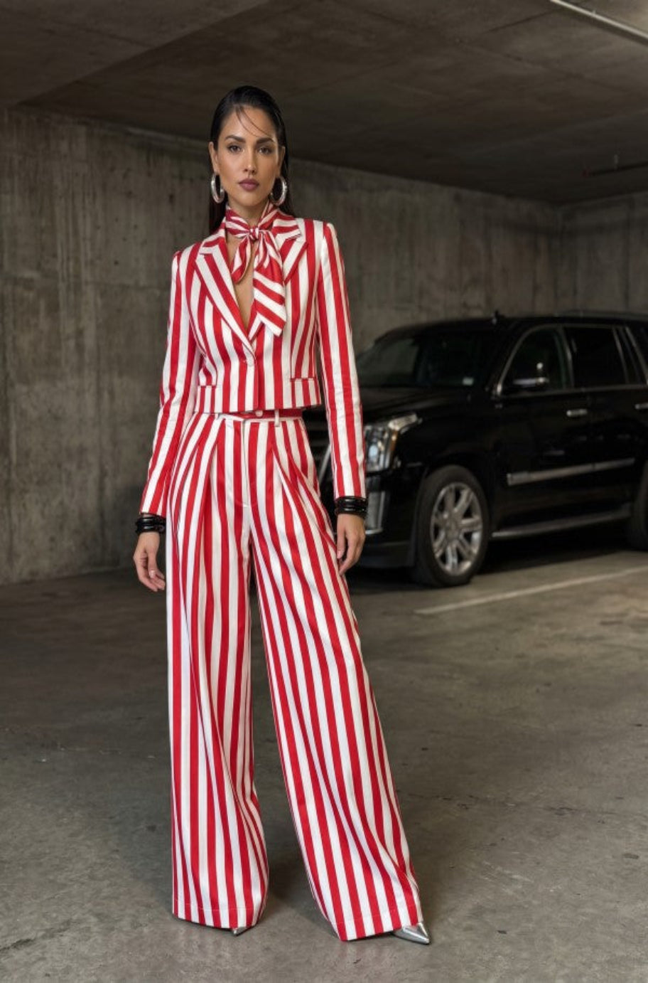 La Dolce Drama striped suit, full length view