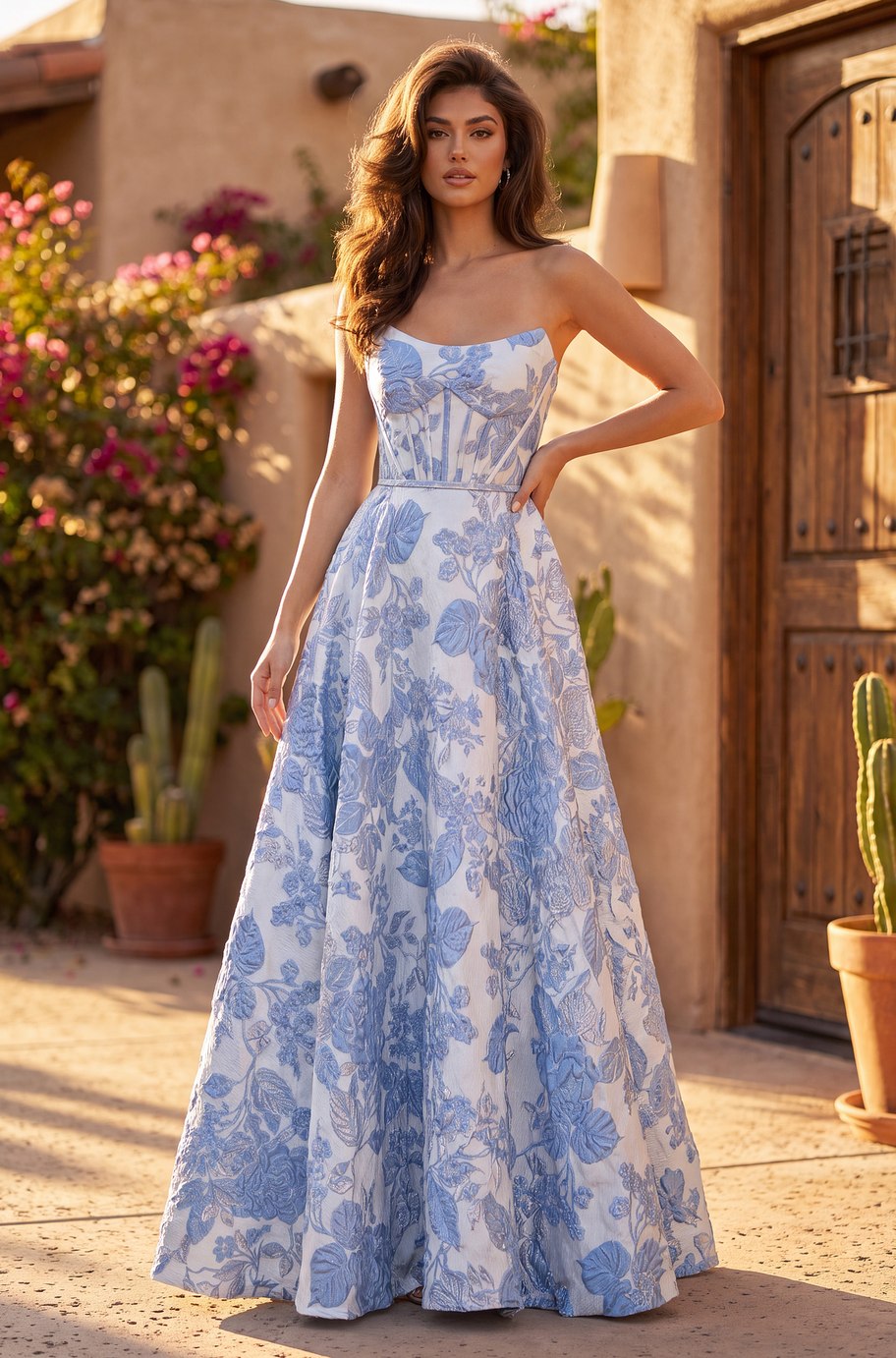 The Azzurra Gown in blue, front view - blue floral jacquard ball gown with corset-style bodice and full skirt
