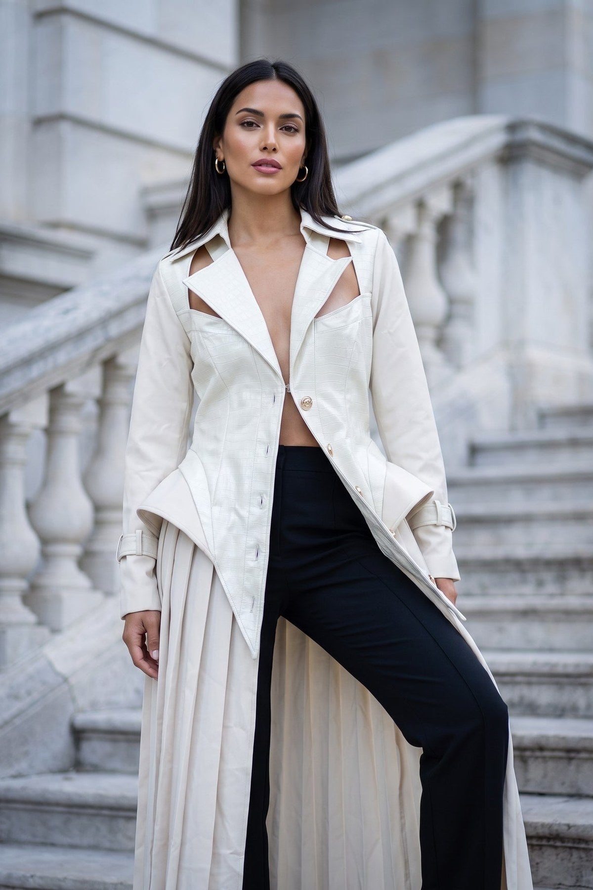 Close-up of the Scala Corset Coat's notched lapels with cut-out collar detailing, epaulettes and gold-tone buttons