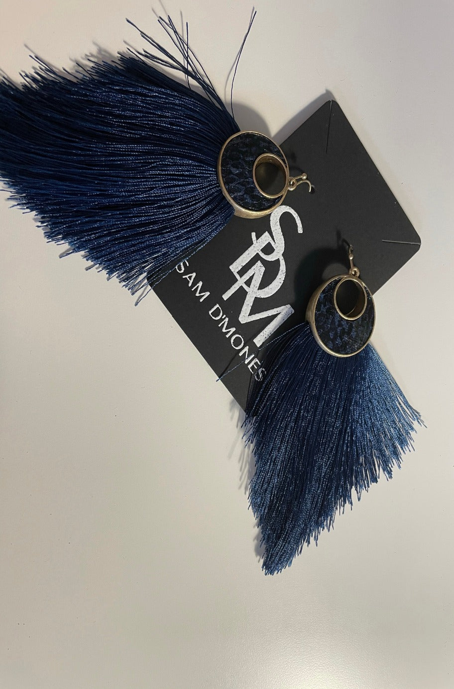 Navy blue crescent tassel drop earrings
