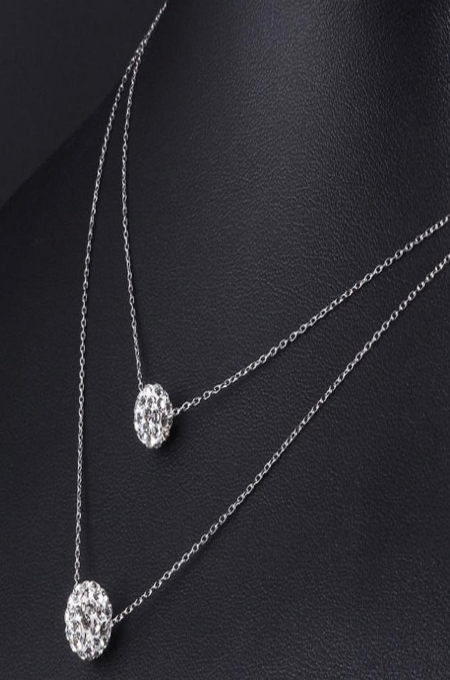 Silver two-layer necklace with crystal ball pendants