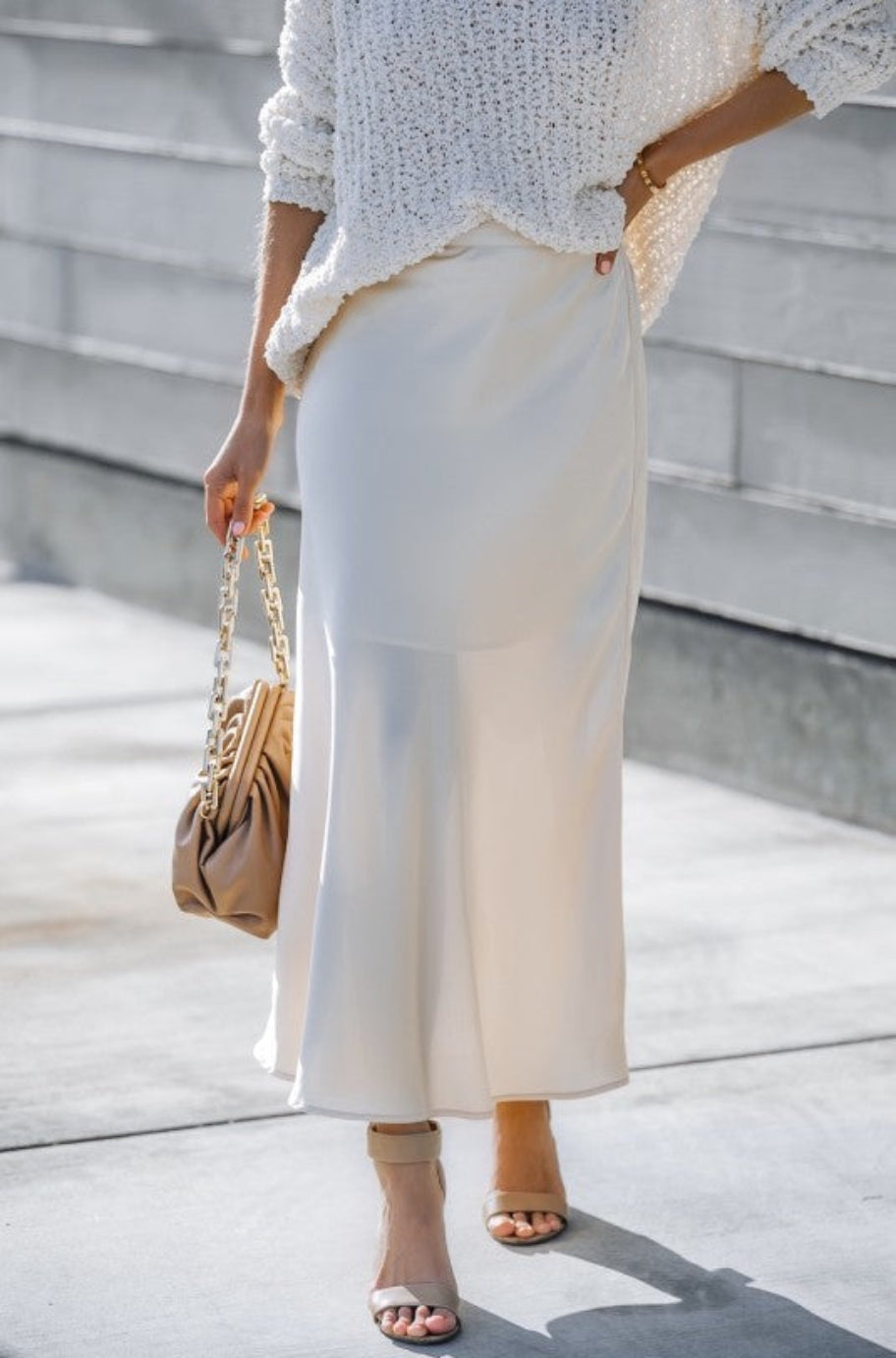 Tuscany champagne midi skirt styled with a knit top