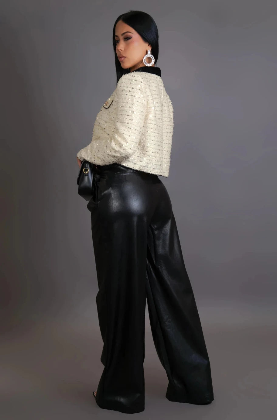Sandro sequin jacket and vegan leather pants set, back view