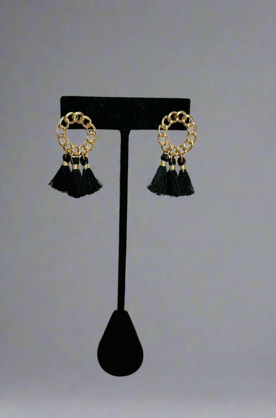 Gold and black chain tassel earrings
