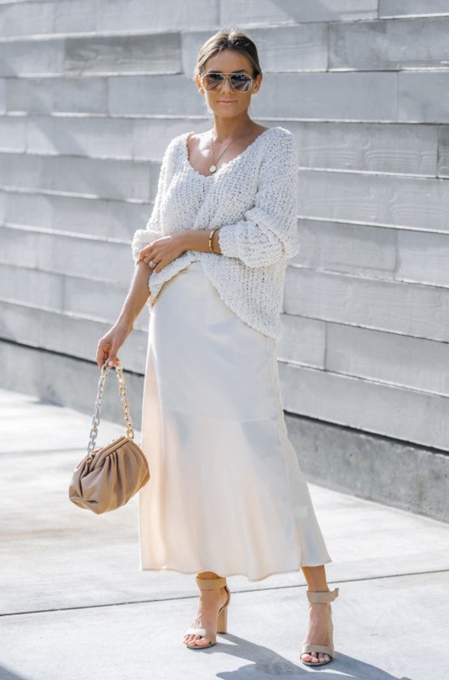 Champagne midi skirt with a high waistband and soft draped fall