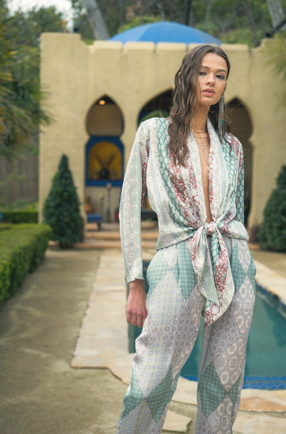 Sage floral satin jumpsuit, side view