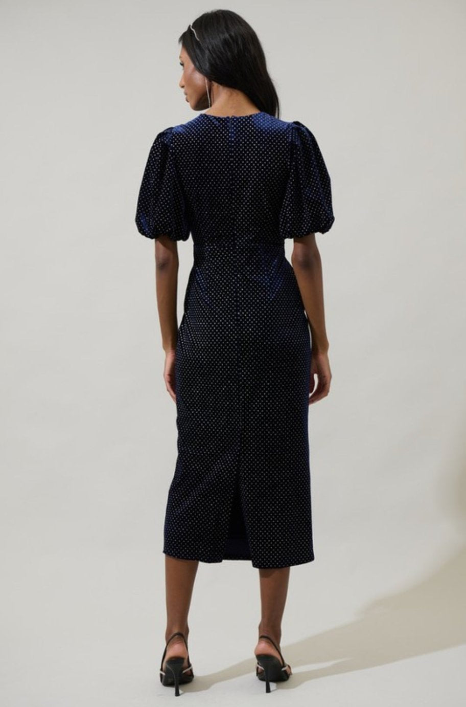 Mila polka dot navy dress showing the front cut-out detail