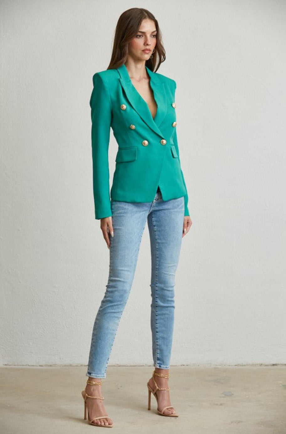 Emerald Enigma blazer styled with light denim