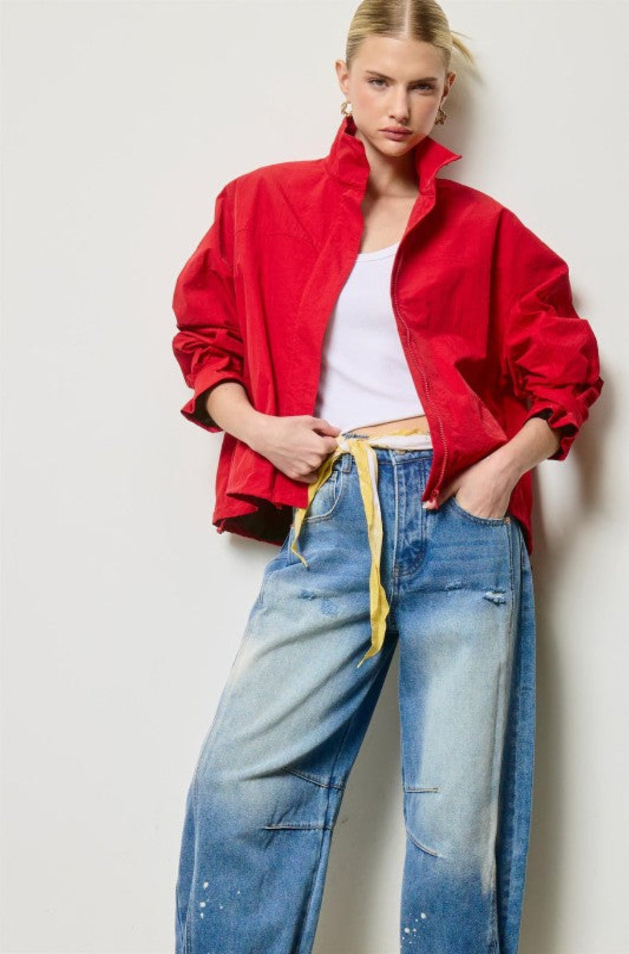 Red oversized zip-front jacket with a high stand collar
