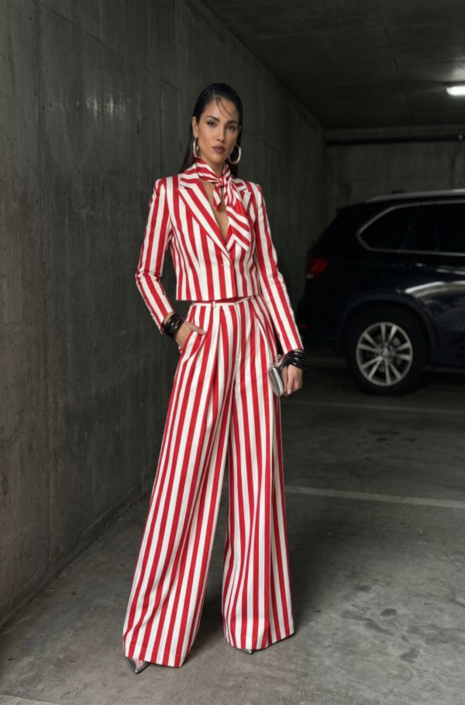Red and white striped blazer with matching wide-leg trousers