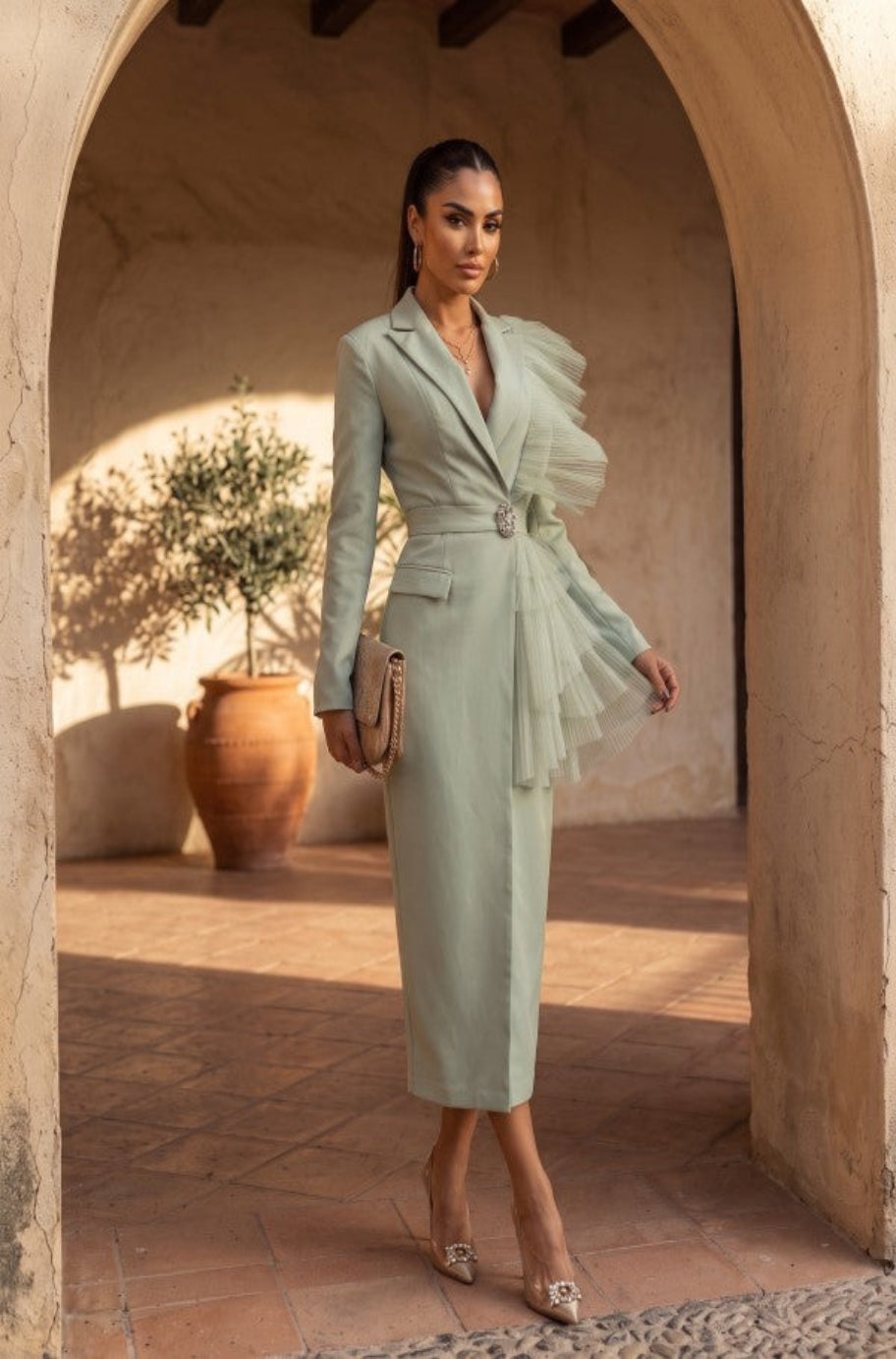 Sage tailored midi dress with architectural lapels and draped detail