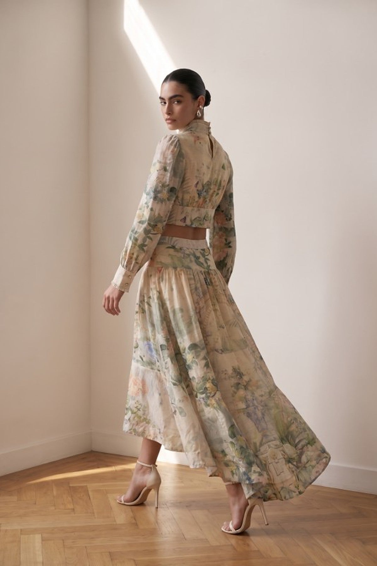Back view of the Giardino Set showing the back-of-neck closure, cropped blouse and longer back hem of the tiered skirt