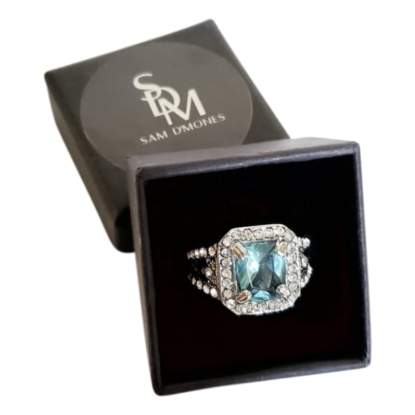 Silver ring with princess cut aquamarine stone