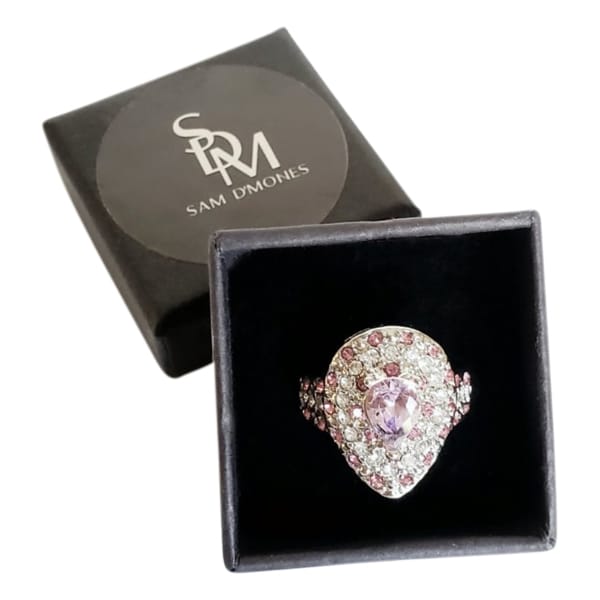 Silver ring with pink pear-shaped stone