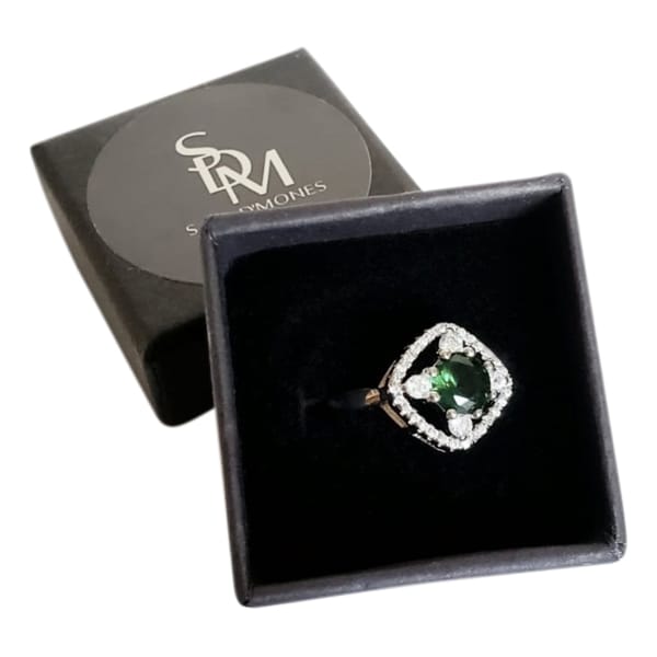 Silver ring with light blue stone
