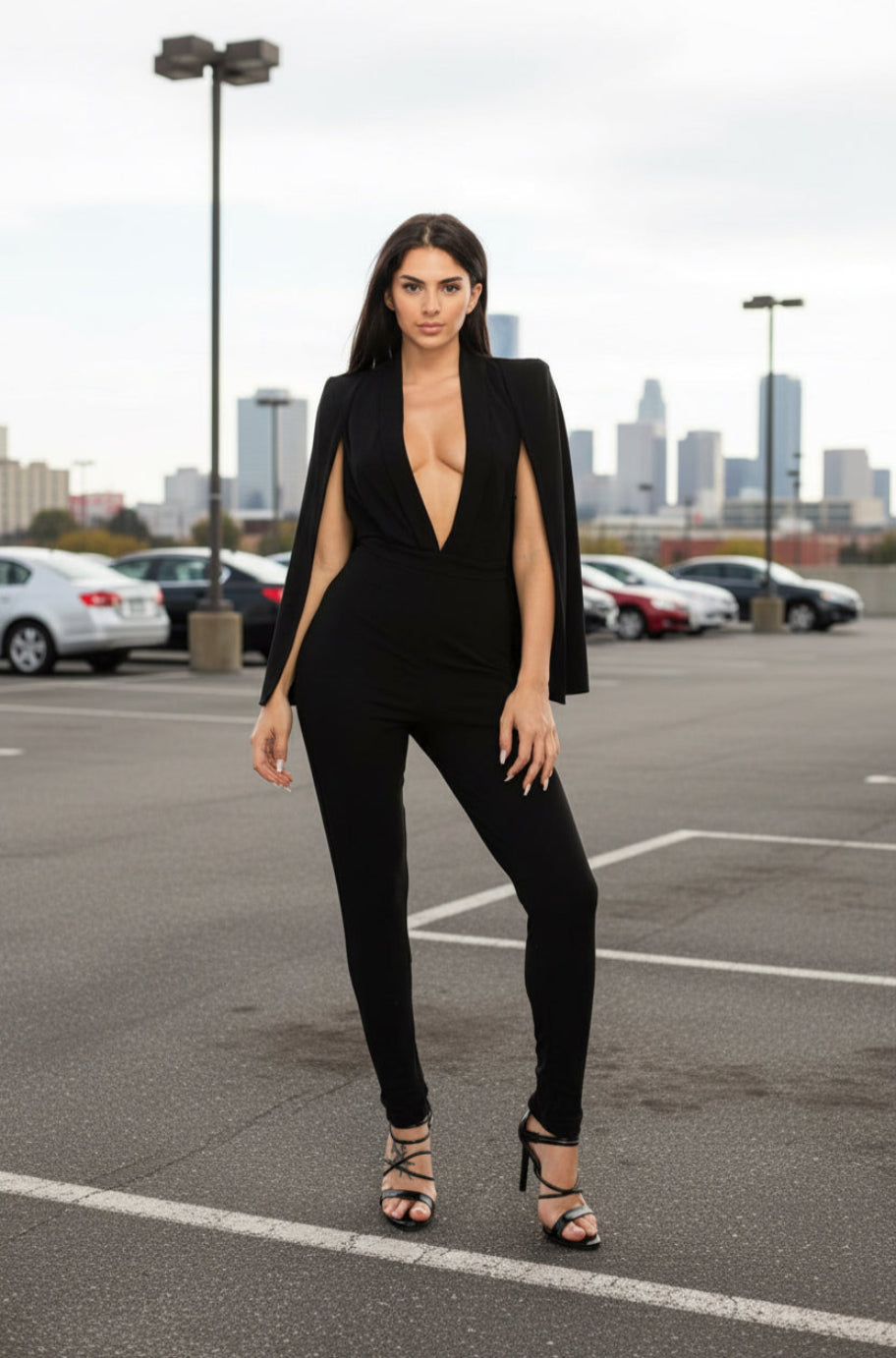 Black jumpsuit with cape sleeves
