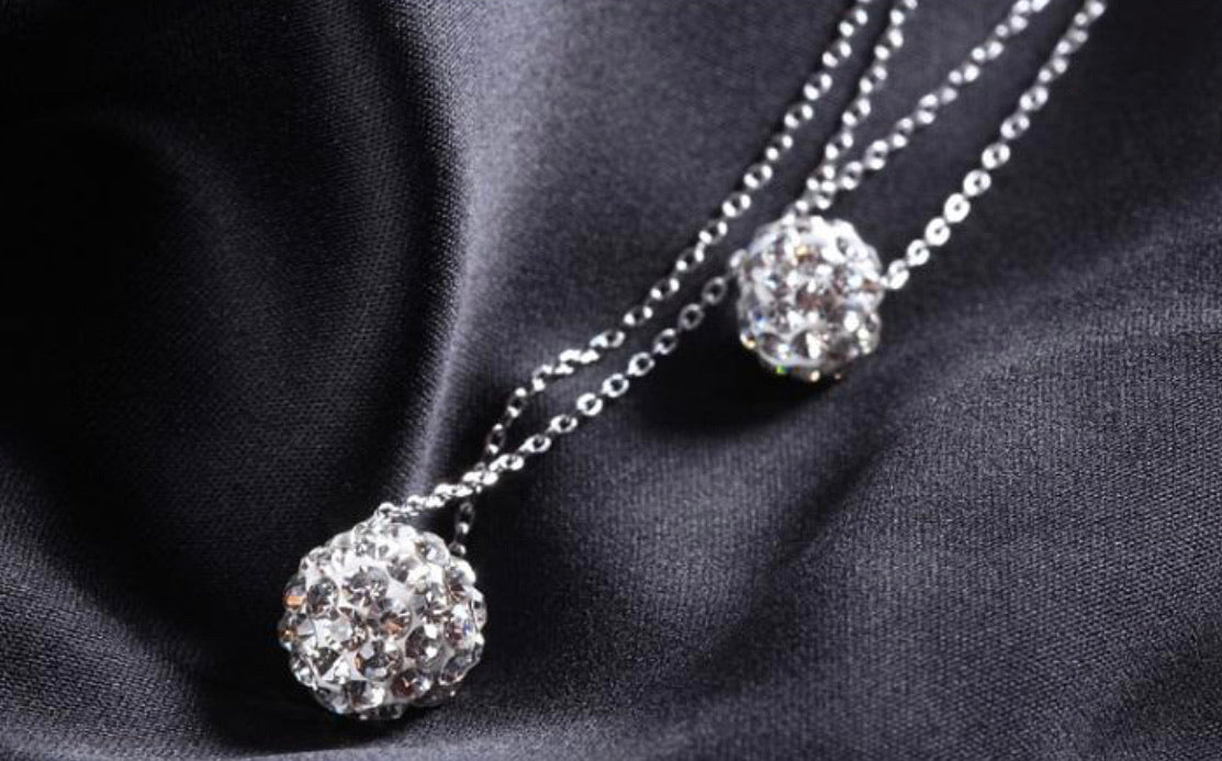 Crystal ball necklace, detail view